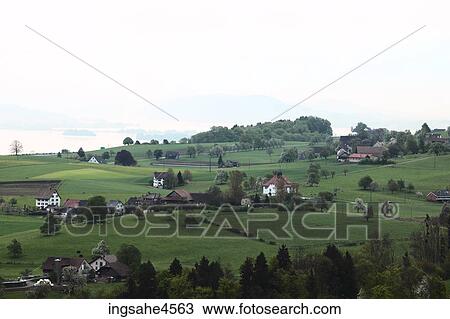 Rural scene of farmhouses along lakeshore View Large Photo Image Stock Image - Rural scene of farmhouses along lakeshore . Fotosearch