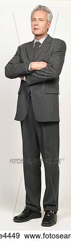 Serious businessman in black suit View Large Photo Image Stock Photo - Serious businessman in black suit. Fotosearch