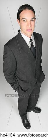 Serious businessman in gray suit View Large Photo Image Picture - Serious businessman in gray suit. Fotosearch
