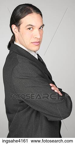 Serious businessman with crossed arms View Large Photo Image Stock Image - Serious businessman with crossed arms. Fotosearch