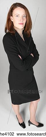 Serious businesswoman in black suit View Large Photo Image Stock Image - Serious businesswoman in black suit . Fotosearch