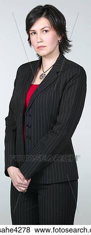Serious businesswoman in black suit View Large Photo Image Stock Photo - Serious businesswoman in black suit . Fotosearch