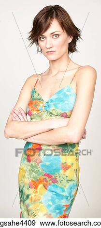 Serious woman in floral sundress View Large Photo Image Stock Photo - Serious woman in floral sundress. Fotosearch
