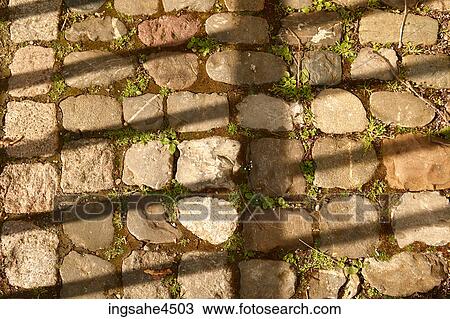 Shadows on walkway View Large Photo Image Stock Image - Shadows on walkway . Fotosearch