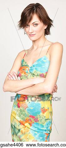 Skeptical woman in floral sundress View Large Photo Image Stock Photograph - Skeptical woman in floral sundress. Fotosearch