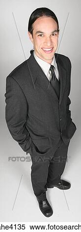 Smiling businessman in gray suit View Large Photo Image Stock Photography - Smiling businessman in gray suit. Fotosearch