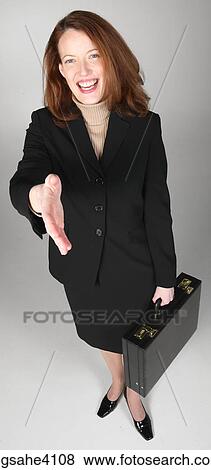 Smiling businesswoman going to shake hands View Large Photo Image Stock Photo - Smiling businesswoman going to shake hands. Fotosearch