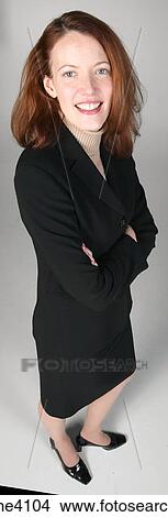 Smiling businesswoman in black suit View Large Photo Image Picture - Smiling businesswoman in black suit . Fotosearch