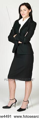 Smiling businesswoman in black suit View Large Photo Image Stock Image - Smiling businesswoman in black suit . Fotosearch