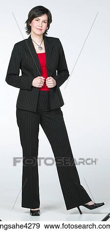 Smiling businesswoman in black suit View Large Photo Image Stock Photo - Smiling businesswoman in black suit . Fotosearch