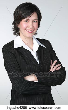 Smiling businesswoman in black suit View Large Photo Image Stock Photography - Smiling businesswoman in black suit . Fotosearch