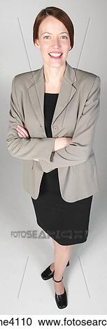 Smiling businesswoman in gray suit View Large Photo Image Stock Image - Smiling businesswoman in gray suit . Fotosearch