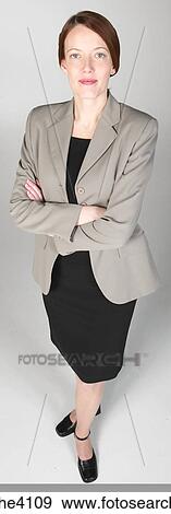 Smiling businesswoman in gray suit View Large Photo Image Stock Photo - Smiling businesswoman in gray suit. Fotosearch