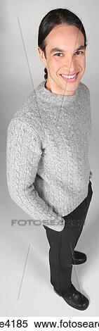 Smiling man in gray sweater View Large Photo Image Stock Photography - Smiling man in gray sweater . Fotosearch