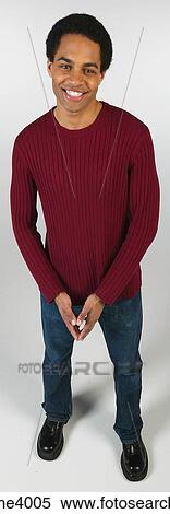 Smiling man in jeans and red sweater View Large Photo Image Stock Photography - Smiling man in jeans and red sweater . Fotosearch