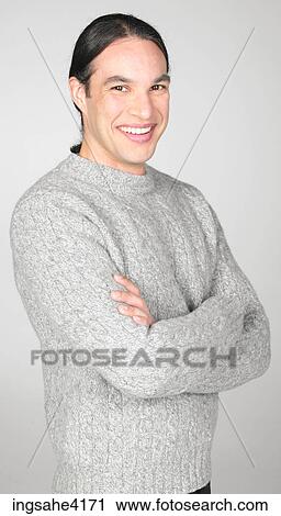 Smiling man in sweater View Large Photo Image Stock Image - Smiling man in sweater . Fotosearch