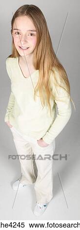 Smiling teenaged girl in white sweater View Large Photo Image Stock Photography - Smiling teenaged girl in white sweater . Fotosearch