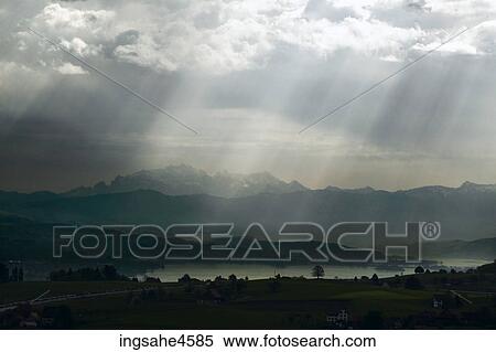Sun shining on countryside View Large Photo Image Stock Photography - Sun shining on countryside. Fotosearch