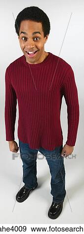 Surprised man in jeans and red sweater View Large Photo Image Stock Photo - Surprised man in jeans and red sweater. Fotosearch