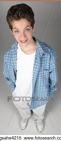 Stock Photography - Surprised teenaged boy. Fotosearch