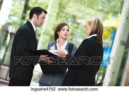 Talking businesspeople View Large Photo Image Stock Image - Talking businesspeople . Fotosearch