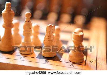 White pieces of carved wooden chess set View Large Photo Image Stock Photography - White pieces of carved wooden chess set. Fotosearch