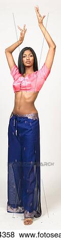 Woman dancing in pink and blue outfit View Large Photo Image Stock Photo - Woman dancing in pink and blue outfit. Fotosearch