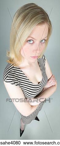 Stock Image - Woman gazing upwards . Fotosearch