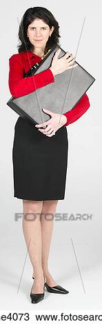 Woman hugging a briefcase View Large Photo Image Stock Image - Woman hugging a briefcase . Fotosearch