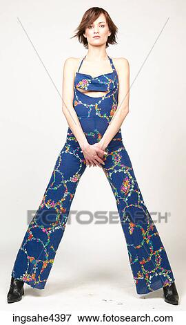 Woman in blue patterned outfit View Large Photo Image Stock Photo - Woman in blue patterned outfit. Fotosearch
