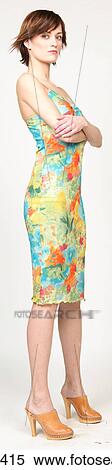 Woman in colorful floral sundress View Large Photo Image Stock Photography - Woman in colorful floral sundress. Fotosearch