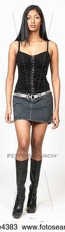 Stock Image - Woman in nightclub wear . Fotosearch
