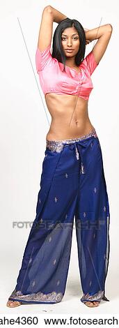 Woman in pink and blue belly dancing outfit View Large Photo Image Stock Image - Woman in pink and blue belly dancing outfit . Fotosearch
