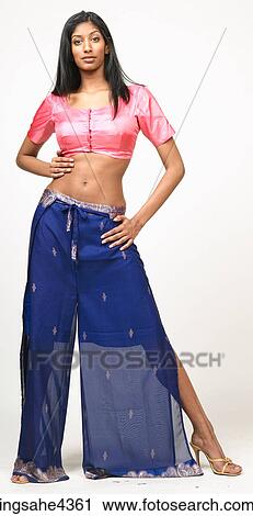 Woman in pink and blue belly dancing outfit View Large Photo Image Stock Image - Woman in pink and blue belly dancing outfit . Fotosearch