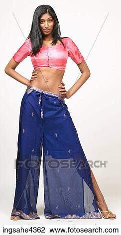 Woman in pink and blue belly dancing outfit View Large Photo Image Stock Image - Woman in pink and blue belly dancing outfit. Fotosearch
