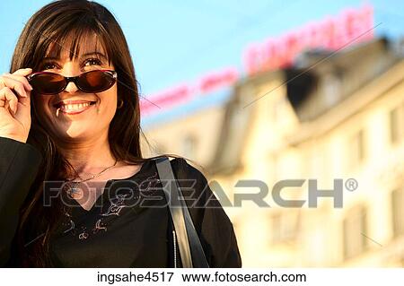 Woman in sunglasses View Large Photo Image Stock Photo - Woman in sunglasses . Fotosearch