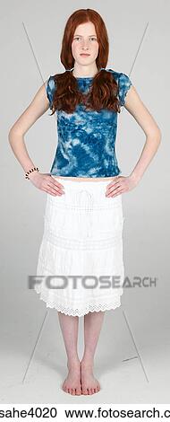 Woman standing and posing View Large Photo Image Stock Image - Woman standing and posing . Fotosearch