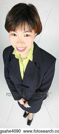 Woman standing and smiling View Large Photo Image Stock Image - Woman standing and smiling . Fotosearch