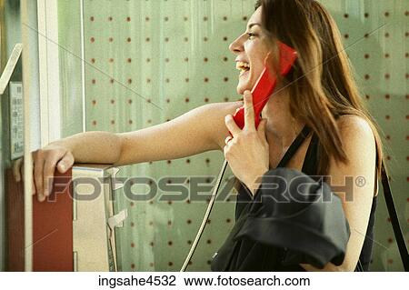 Woman talking on payphone View Large Photo Image Stock Image - Woman talking on payphone . Fotosearch