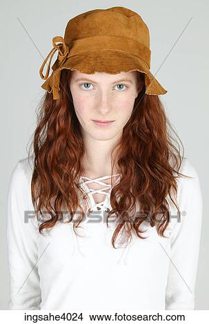 Woman wearing a hat View Large Photo Image Picture - Woman wearing a hat . Fotosearch