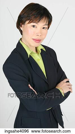 Woman with her arms folded View Large Photo Image Stock Photograph - Woman with her arms folded . Fotosearch