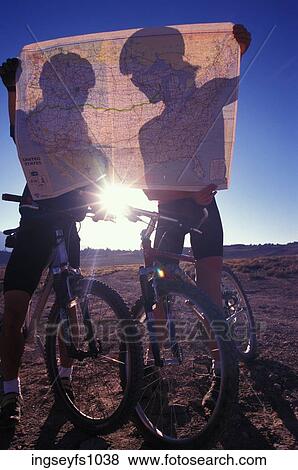 Bikers Looking at a Map View Large Photo Image Stock Photo - Bikers Looking at a Map. Fotosearch