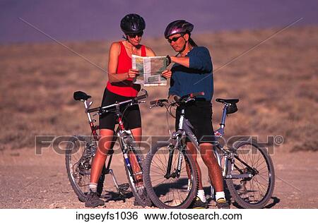 Bikers Looking at a Map View Large Photo Image Stock Photograph - Bikers Looking at a Map. Fotosearch