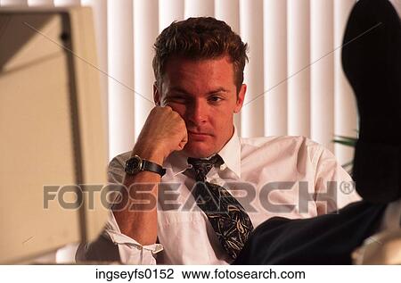Bored at Work View Large Photo Image Stock Image - Bored at Work. Fotosearch