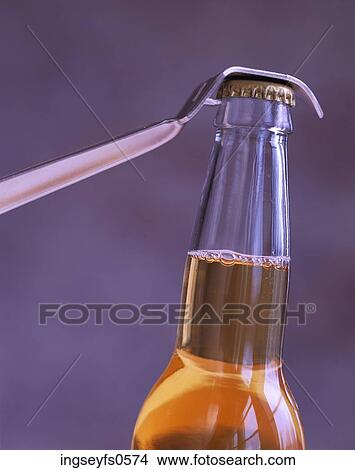 Picture - Bottle Opener and Beer. Fotosearch