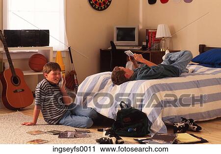 Boys Hanging Out in Bedroom View Large Photo Image Stock Image - Boys Hanging Out in Bedroom. Fotosearch