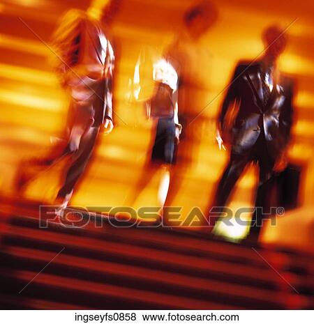 Business Professionals Walking Downstairs View Large Photo Image Stock Photo - Business Professionals Walking Downstairs. Fotosearch
