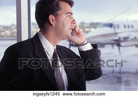 Businessman on Cell Phone View Large Photo Image Stock Photography - Businessman on Cell Phone. Fotosearch