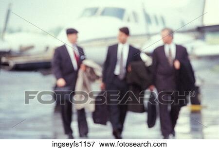 Businessmen Getting off Plane View Large Photo Image Stock Photo - Businessmen Getting off Plane. Fotosearch