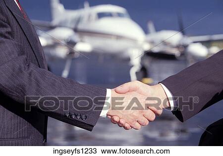 Businessmen Shaking Hands View Large Photo Image Stock Image - Businessmen Shaking Hands. Fotosearch